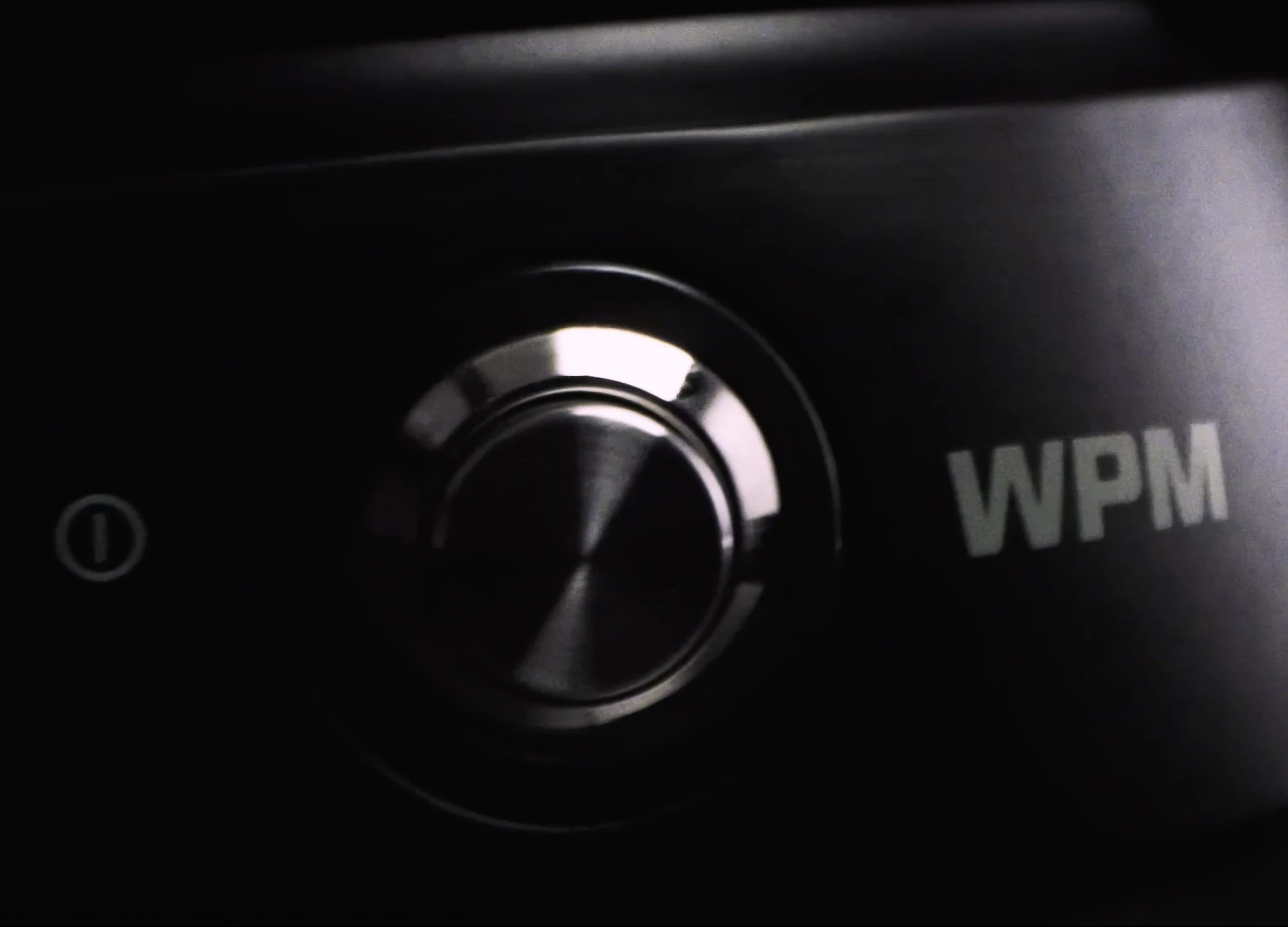 Close-up of a control button for the WPM KONOS grinder