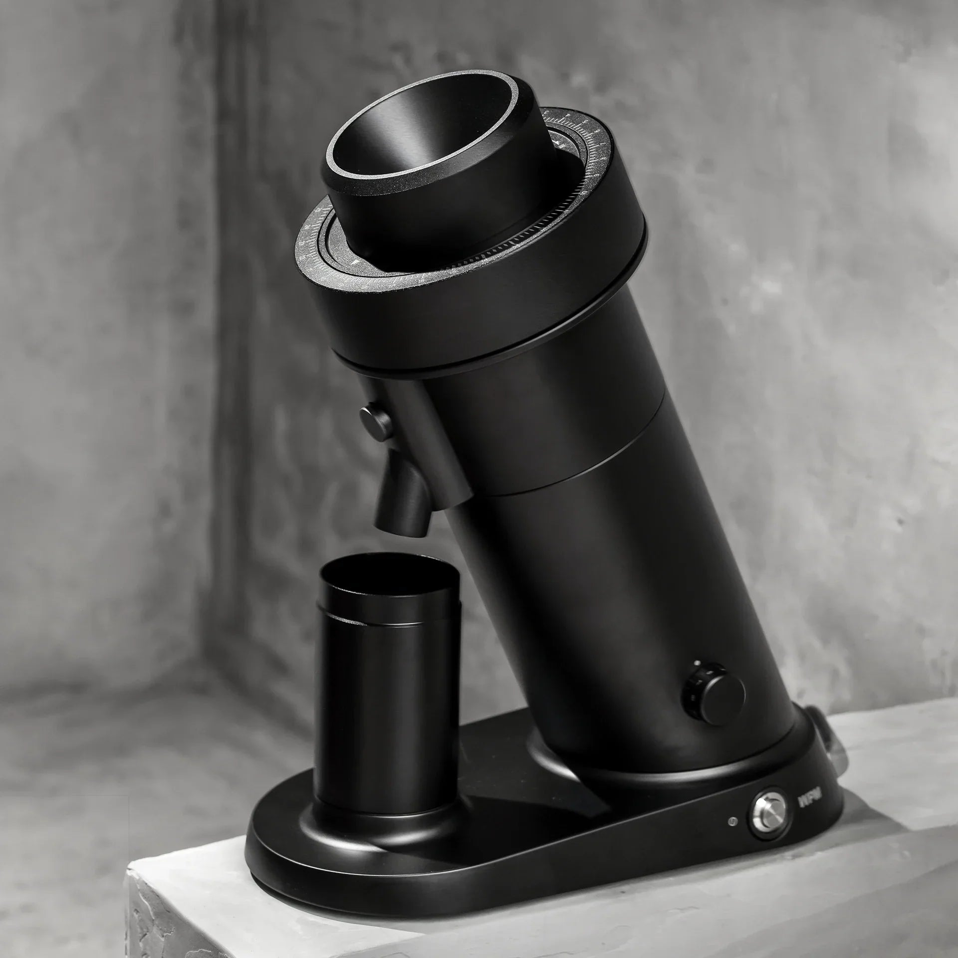 WPM ZP1 Single Dose Grinder showcasing Italian flat burr technology in a sleek black design.