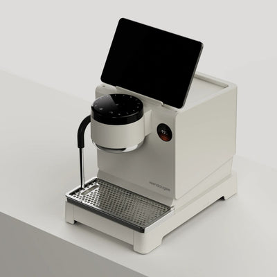 Wendougee LITA BA in white, three-quarter view, shoing the machine from the top and the Control disc with the screen on the side of the machine showing the brew temperature
